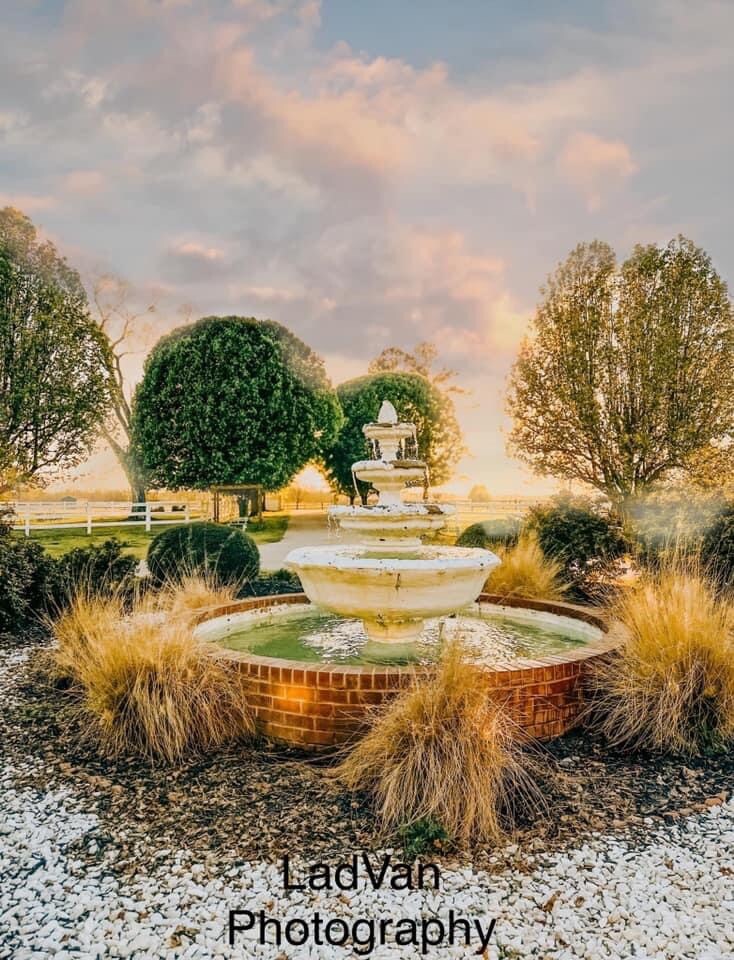 Fountain at Parkton Place glowing at sunset