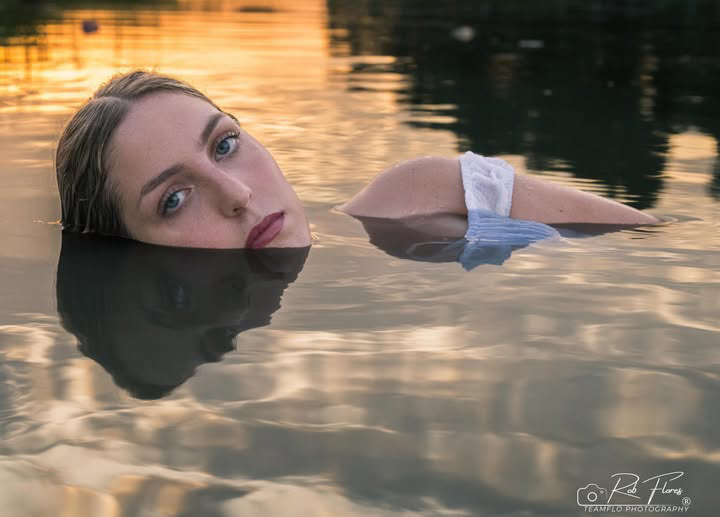 Reflective portrait floating in the Parkton Place pond at sunset